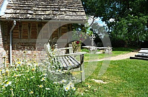 Seat outside St Peters Church, Twineham, Sussex. UK