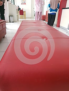 a seat in a red bank photo