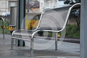 Seat in a train station photo