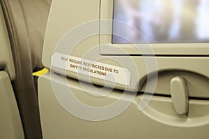 Seat with the warning message that the seat doesn& x27;t recline