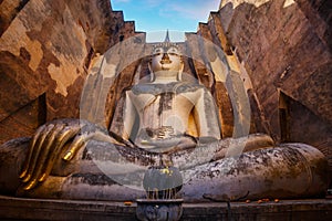 Seated Buddha image at Wat Si Chum temple in Sukhothai Historical Park, a UNESCO world heritage site