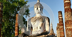 Seated Buddha  at Wat Si Chum temple in Sukhothai Historical Park, Thailand.