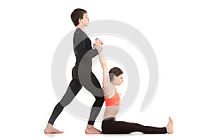 Seated forward bend pose with coach