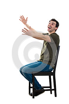 Seated man arms outstretched