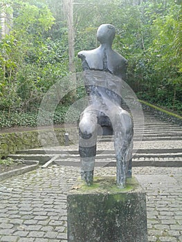 Seated Man Sculpture in Catacumba Park Lagoa Rodrigo de Freitas Rio de Janeiro Brazil. photo