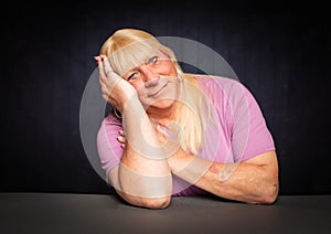 Trans Woman with Head Resting on Her Hand photo