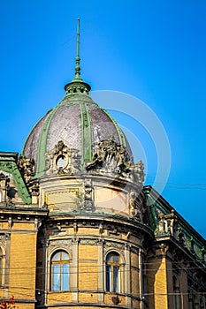 Seated statue of liberty on roof of museum of ethnography in Lviv city, Ucraine