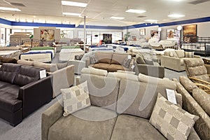 Seating furniture and mattress displayed in store photo