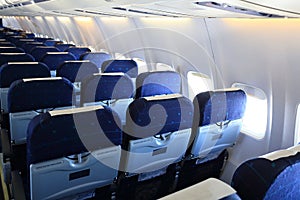 Seats of economy class in airplane photo
