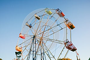 Seats high on ferris wheel