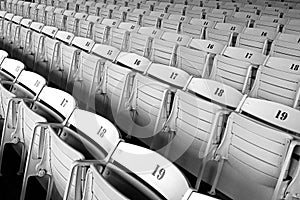 Diagonal rows of bleacher seats seen at a horse racing venue before the crowds arrive photo