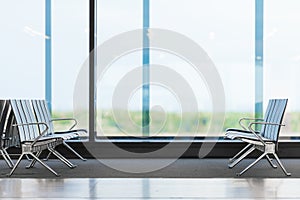 Seats for passengers in airport waiting hall