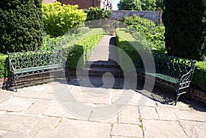 Seats, pathway of Culpepper garden, Leeds Castle garden, England