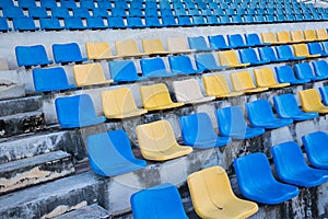 seats at the stadium. plastic spectator seats in stadium, competition concept.