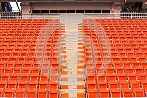 Seats on stadium steps bleacher with spot light pole