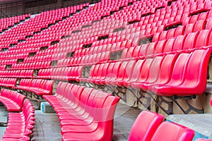 Seats on stadium steps bleacher with spot light pole