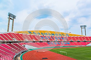 Seats on stadium steps bleacher with spot light pole