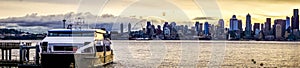 Seattle city skyline early morning with watercraft in foreground photo