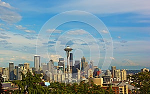 Seattle city skyline with Mount Rainier on background in summer.
