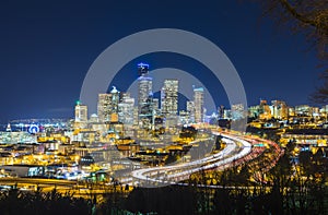 Seattle cityscape at night with traffic light on freeway,Washington,usa