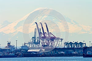 Seattle Port with Red Cranes and Boats with Mt Rainier in the bac