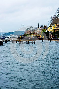 Seattle Beach Dock Puget Sound Washington State Harbor Boat Yellow Apartment Blue Water Rocks Trees Evergreen Beautiful Bay Landsc