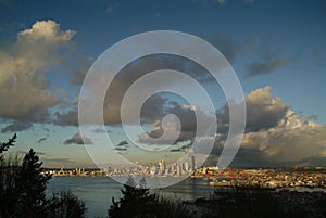 Seattle Skyline During a Dramatic Sunset and a Rain Squall Passing Through. photo