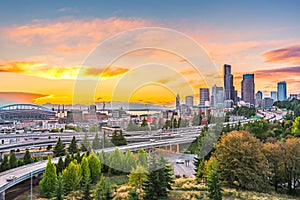 Seattle skylines and Interstate freeways converge with Elliott Bay and the waterfront background of in sunset time, Seattle, Washi photo