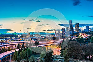 Seattle skylines and Interstate freeways converge with Elliott Bay and the waterfront background of in sunset time, Seattle, Washi