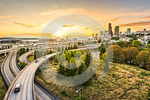 Seattle skylines and Interstate freeways converge with Elliott Bay and the waterfront background of in sunset time, Seattle, Washi