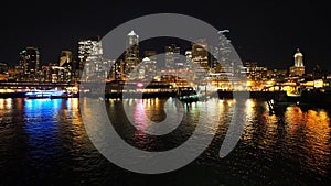 Seattle, Washington skyline from Seattle - Bainbridge Island ferry at night..