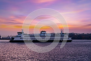 Seattle, Washington, USA, Elliot Bay in Seattle with Ferry at sunset Washington State,