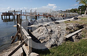 Seawall breakwall construction strengthening work on large body of water