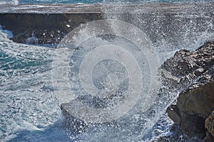 Seawater Crashing on Rocks