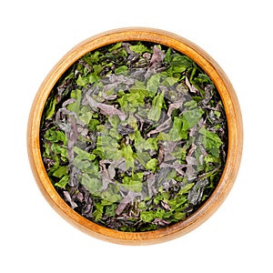 Seaweed flakes, mix of dulse, sea lettuce and nori, in wooden bowl
