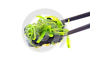 Seaweed Salad Sushi with Chopsticks.