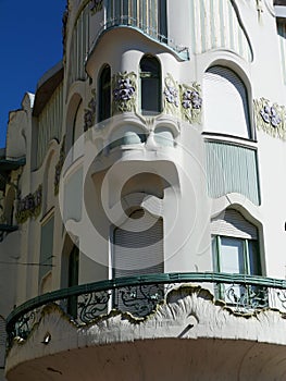 Secessionist style facade detail with balcony and green window