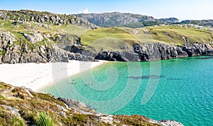 Secluded beach in Achmelvich Bay, Scotland