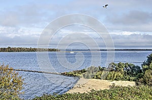 Secluded beach by lake Grevelingen