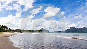 Secluded beach landscape in El Nido Palawan.Pristine cove with Cadlao Island view.Tropical beach lanscape.