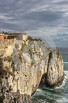 Secluded house on the edge of a cliff by the sea