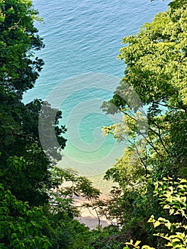 Secluded Japanese beach, pristine condition, remote. photo