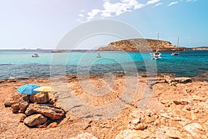 Secluded little rocky beach on the Ibiza island. Balearic Islands, Spain