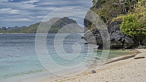 A secluded sandy beach on a tropical island. Philippines. Palawan. El Nido