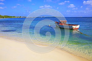 Secluded turquoise beach in Aruba, Caribbean Blue sea, Duth Antilles