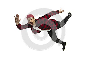 A second before falling - young man falling down with bright emotions and expression