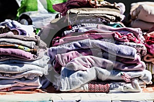 Second hand baby clothes and pyjamas for reusing or reselling