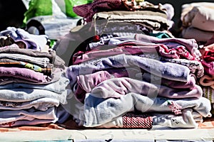 Second hand baby clothes and pyjamas for reusing or reselling photo