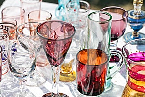 Second hand beautiful glasses in different shapes and colors