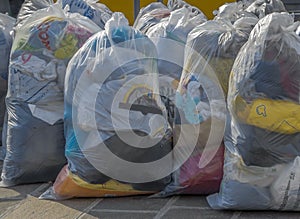 Second-hand clothes in plastic bags